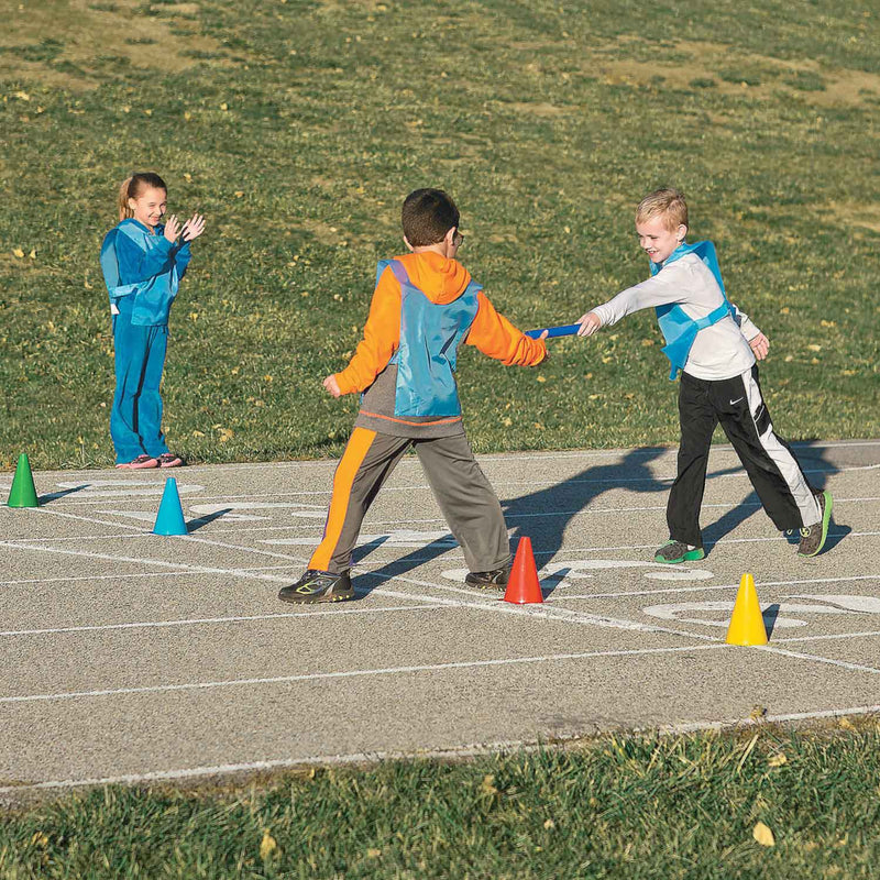 Kids running relay race