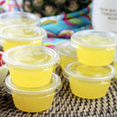 Clear Portion Containers filled with yellow drink