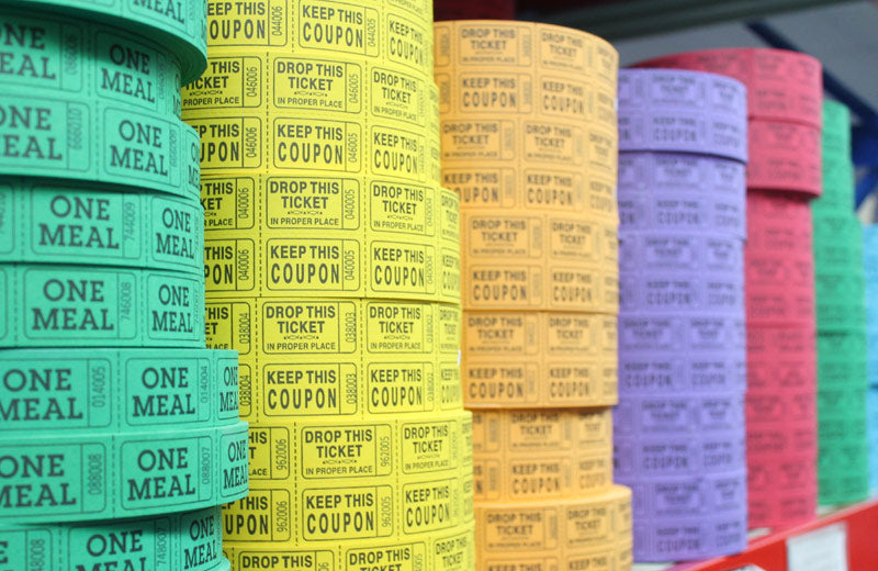 shelf full of tickets rolls